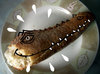 Cartoon: HOME FAUNA (small) by ALEX gb tagged alligator head dish bread home