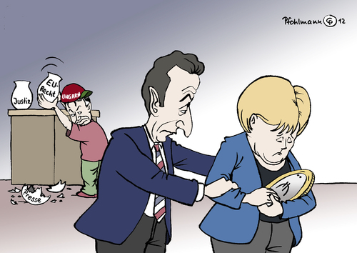 Cartoon: Kaputtmacher (medium) by Pfohlmann tagged karikatur,color,farbe,2012,eu,ungarn,orban,pressefreiheit,demokratie,verstoß,verstöße,recht,europa,eurokrise,schuldenkrise,euro,sarkozy,merkel,frankreich,deutschland,münze,sorge,kind,kinder,kümmern,ungarn,orban,pressefreiheit,demokratie,verstoß,verstöße,recht,europa,eurokrise,schuldenkrise,sarkozy,merkel,frankreich,deutschland