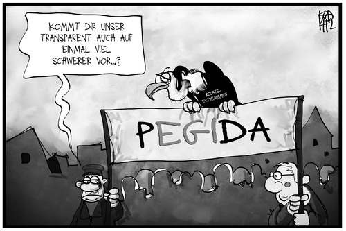 Cartoon: PEGIDA (medium) by Kostas Koufogiorgos tagged karikatur,koufogiorgos,illustration,cartoon,pegida,demo,transparent,geier,rechtsextremismus,last,populismus,politik,karikatur,koufogiorgos,illustration,cartoon,pegida,demo,transparent,geier,rechtsextremismus,last,populismus,politik